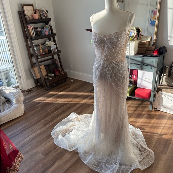 Elegant White Beaded Wedding Gown - Picture 9 of 13